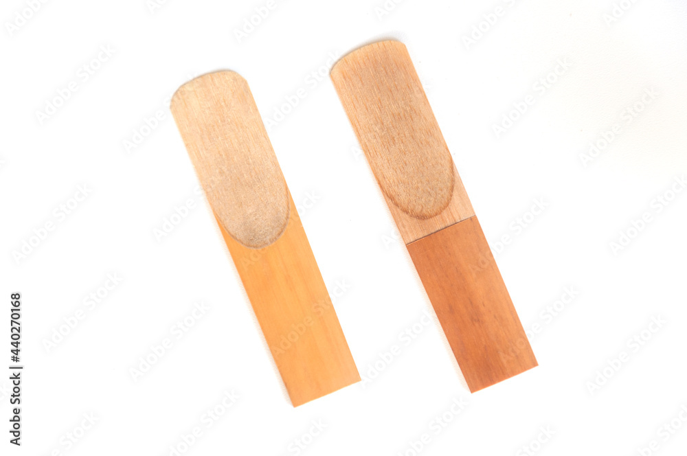 close-up saxophone reeds isolated on a white background close-up saxophone reeds isolated on a white background