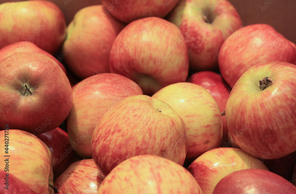 Background of ripe pink apples in the store Background of ripe pink apples in the store