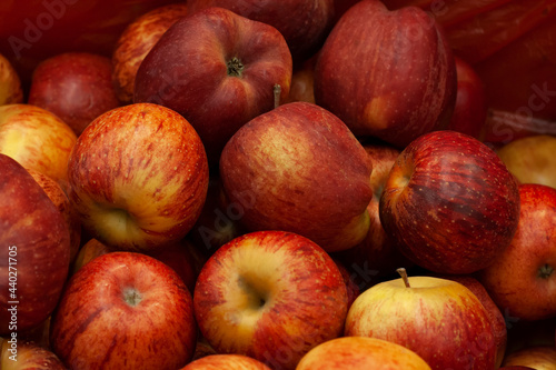 Background of ripe red apples in the store