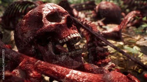 Bloody bones and skulls lie on the battlefield in the middle of the forest. War and apocalypse concept. 3D Rendering.