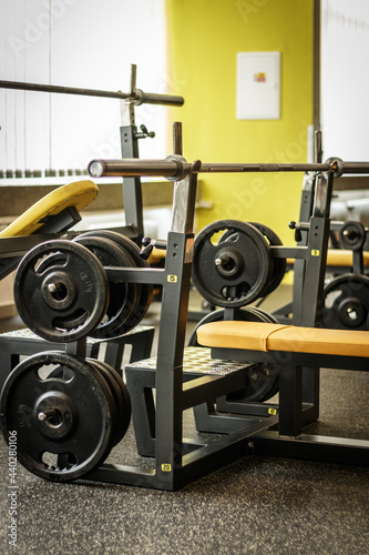 Gym interior with equipment. Sports equipment in the gym. Workout equipment. 