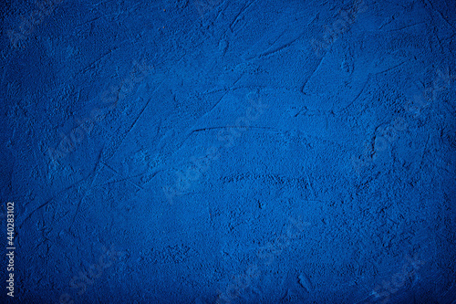 Textured embossed dark blue background
