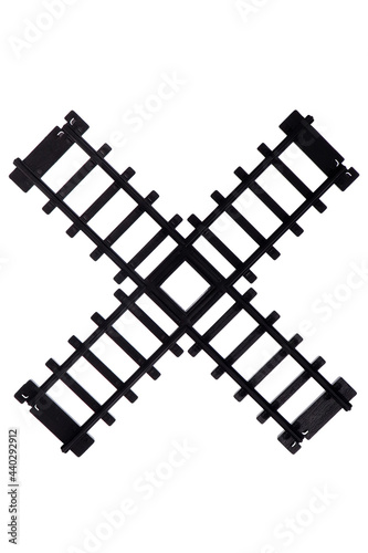 The rail intersection. Toy rails on a white background, isolated.