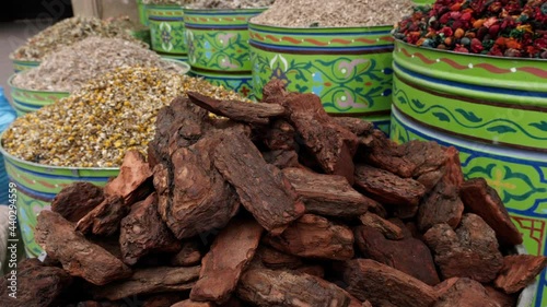 Moroccan incense, sandalwood, herbs, tea. Spice market in the Medina of Marrakech, Morocco.