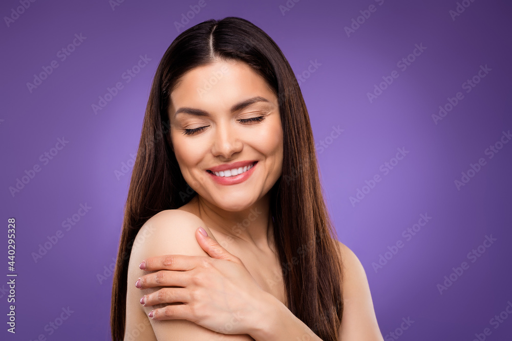 Photo of cute adorable young lady wear nothing hugging herself closed eyes smiling isolated purple color background Photo of cute adorable young lady wear nothing hugging herself closed eyes smiling isolated purple color background
