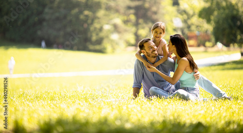 Happy young family with cut...