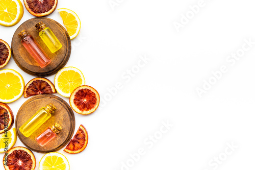 Citrus cosmetic with vitamin c and fruits essential oil. Top view