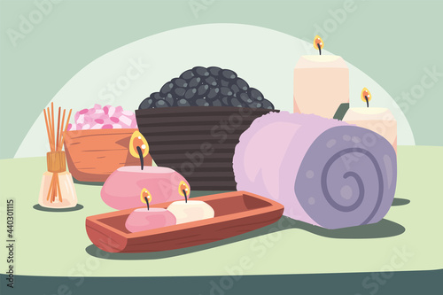 candles stones and towel
