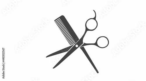 Comb and Scissors icon. Vector isolated illustration of a comb and a hairdresser scissors.