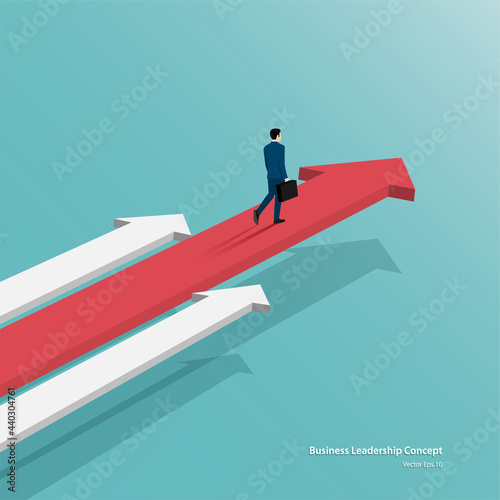 Businessman walking on red arrow up go to success in career