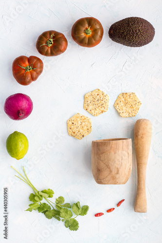 Composition of fresh ingredients for guacamole photo