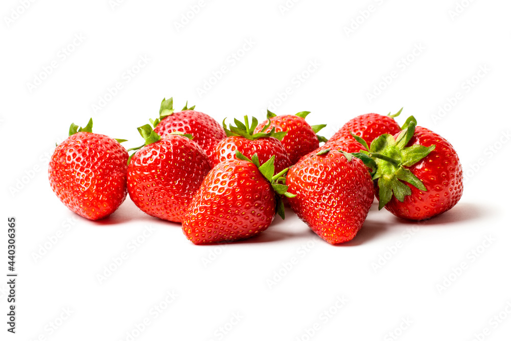 a few strawberries on a white background closeup