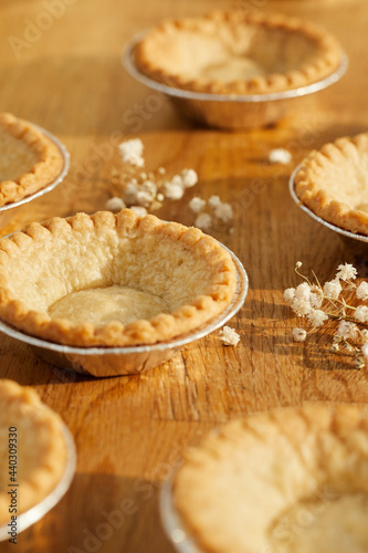 empty pie crust on a wooden table