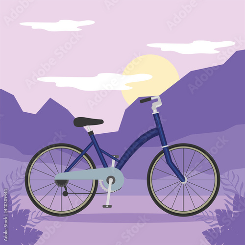 blue bike in front of purple mountains