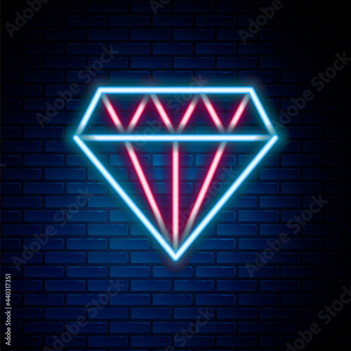 Glowing neon line Diamond icon isolated on brick wall background. Jewelry symbol. Gem stone. Colorful outline concept. Vector