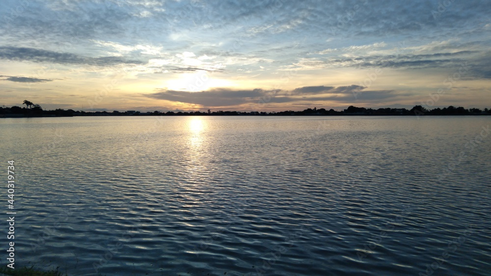 Fototapeta premium sunset over the river