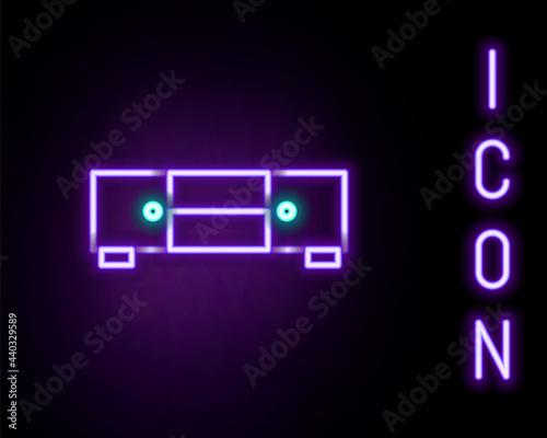 Glowing neon line Chest of drawers icon isolated on black background. Colorful outline concept. Vector