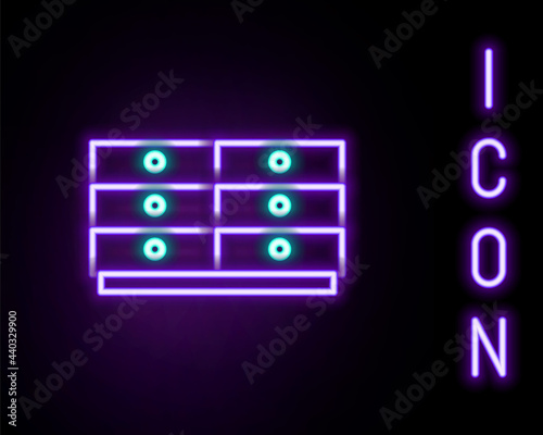 Glowing neon line Chest of drawers icon isolated on black background. Colorful outline concept. Vector