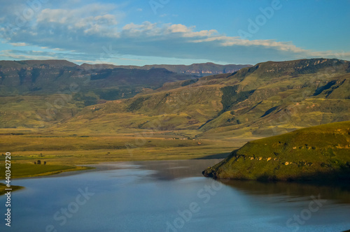 Drakensberg mountain escarpment and bell park dam around Cathkin park in Kwazulu natal South Africa photo