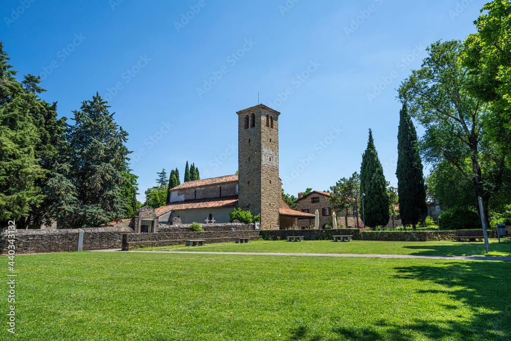 Muggia, Italy. June 13, 2021 view of the church of St. Mary Assunta in the old Muggia archaeological park