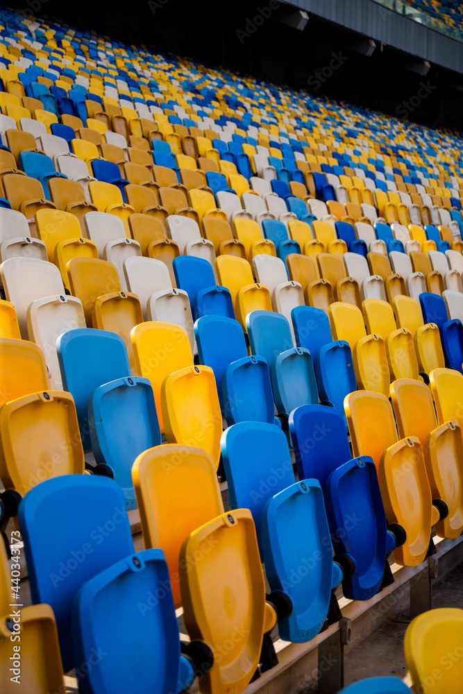 Naklejka premium Empty rows of seats in a football olympic stadium