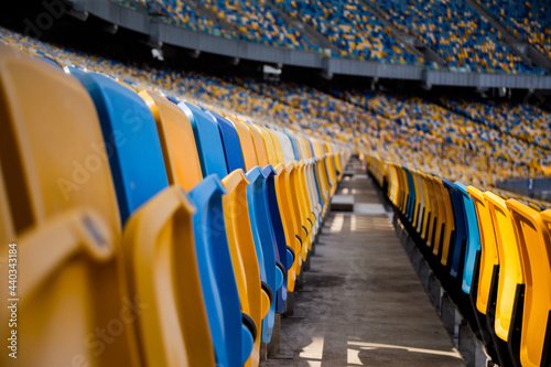 Empty rows of seats in a football olympic stadium © Hennadii