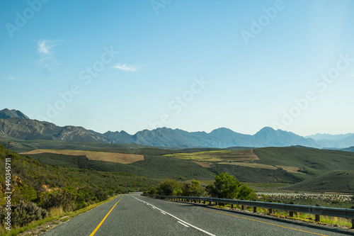 Route 62 through rolling hills and mountains in Western Cape South Africa
