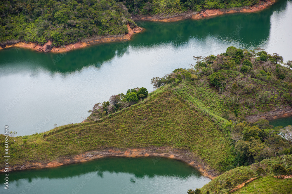Fototapeta premium View at the top of El Penon de Guatape looking out at a beautiful view of the lagoon. Close up