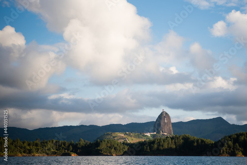 Bild auf Leinwand View of El Penon de Guatape in the distance from the water.
