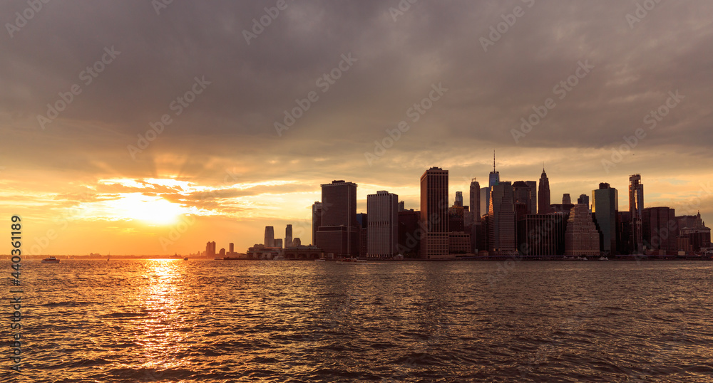 Stunning New York City sunset beyond the clouds