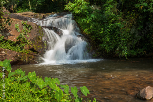 a beautiful waterfall in the forest