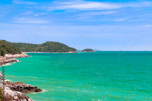 Landscape of Seascape at Koh sichang is a tropical island with emerald green water and beautiful beaches in the clear blue sky.