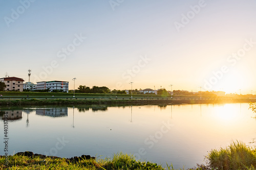 Samutprakarn, Thailand Morning sunrise over the River in rural and countryside area near national airport airport, warm cool tone There are many of athlete come to cycling and biking around this area 