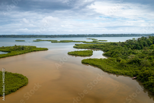 Tropical Island Aerial View. Wild coastline lush exotic green jungle. Red Frog Beach in Bastimentos Island, Bocas del Toro, Central America, Panama.