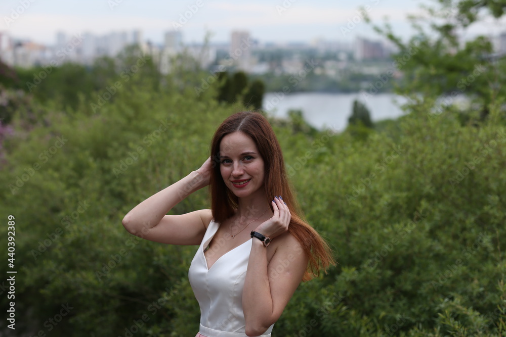 Portrait of young woman in the park