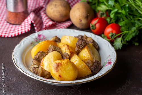 From traditional delicious Turkish food; potato and meat dish in casserole (Turkish name; Guvec tas kebabi)