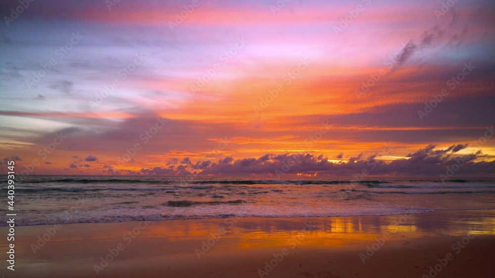 June 15, 2021. PHUKET THAILAND SEA BEACH. Dramatic sea sunset. Burning sky and shining golden waves. Amazing scene of Beautiful golden beach refection sunlight in sunset in the sea. June 15, 2021. PHUKET THAILAND SEA BEACH. Dramatic sea sunset. Burning sky and shining golden waves. Amazing scene of Beautiful golden beach refection sunlight in sunset in the sea.