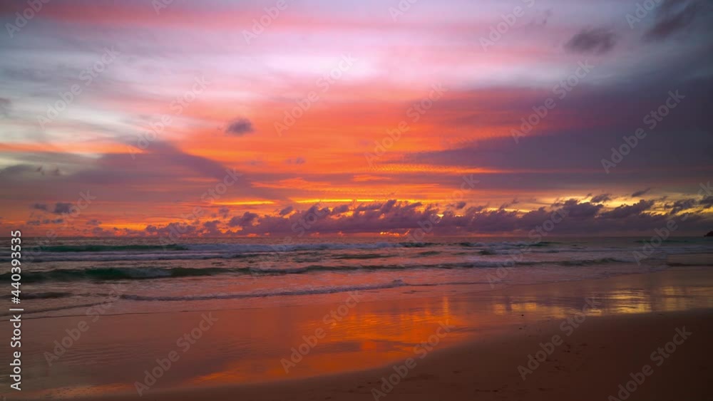 June 15, 2021. PHUKET THAILAND SEA BEACH. Dramatic sea sunset. Burning sky and shining golden waves. Amazing scene of Beautiful golden beach refection sunlight in sunset in the sea. June 15, 2021. PHUKET THAILAND SEA BEACH. Dramatic sea sunset. Burning sky and shining golden waves. Amazing scene of Beautiful golden beach refection sunlight in sunset in the sea.