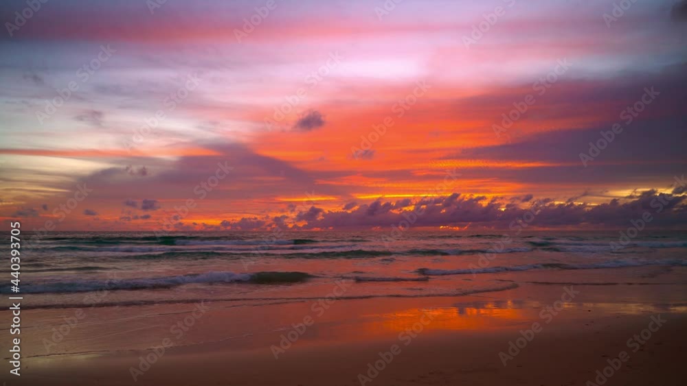 June 15, 2021. PHUKET THAILAND SEA BEACH. Dramatic sea sunset. Burning sky and shining golden waves. Amazing scene of Beautiful golden beach refection sunlight in sunset in the sea. June 15, 2021. PHUKET THAILAND SEA BEACH. Dramatic sea sunset. Burning sky and shining golden waves. Amazing scene of Beautiful golden beach refection sunlight in sunset in the sea.