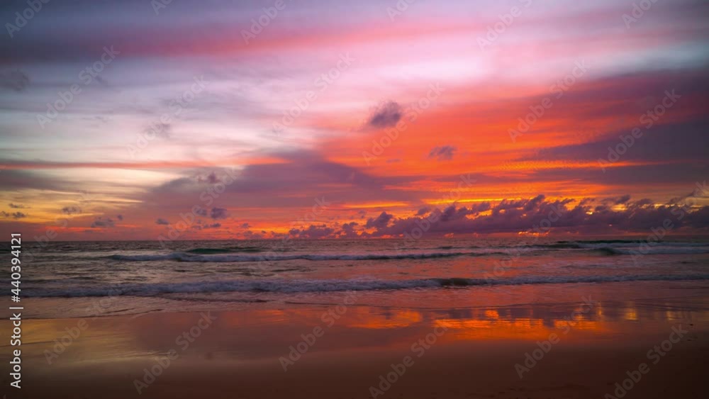 June 15, 2021. PHUKET THAILAND SEA BEACH. Dramatic sea sunset. Burning sky and shining golden waves. Amazing scene of Beautiful golden beach refection sunlight in sunset in the sea. June 15, 2021. PHUKET THAILAND SEA BEACH. Dramatic sea sunset. Burning sky and shining golden waves. Amazing scene of Beautiful golden beach refection sunlight in sunset in the sea.