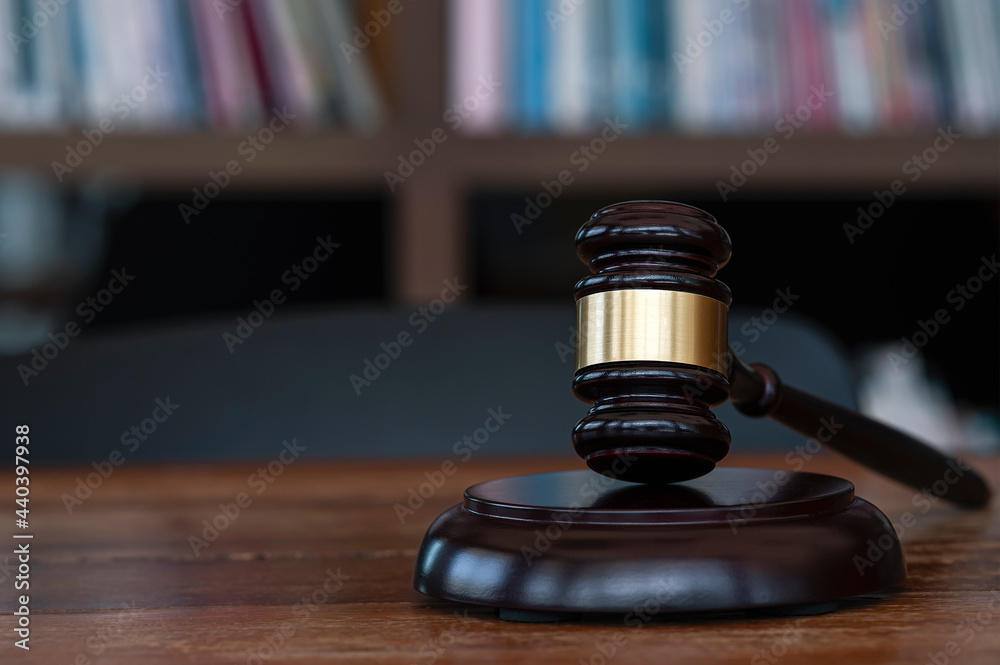 Closeup Judge's gavel on wooden table. Law concept.