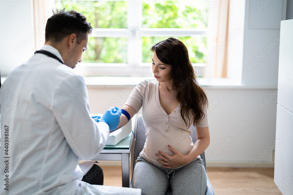 Fototapeta premium Prenatal Screening. Doctor Drawing Blood Sample