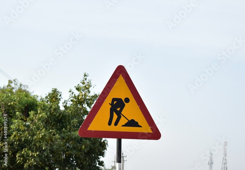 Men at work warning sign board