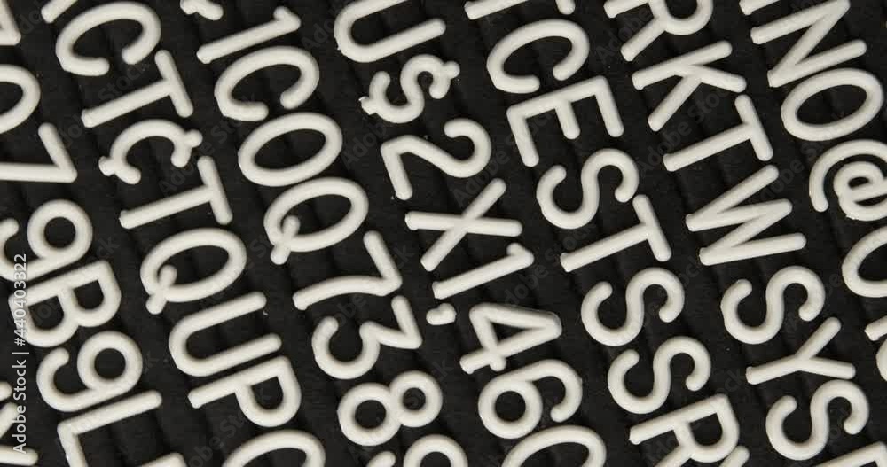 White random numbers and letters on black background are moving in circular rotation.