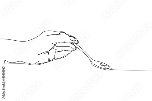 Continuous one line of tea spoon in hand in silhouette on a white background. Linear stylized.Minimalist.