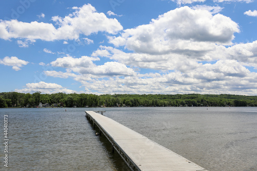 View of Conesus lake and boat dock at Long Point beach park.  Geneseo, New York.