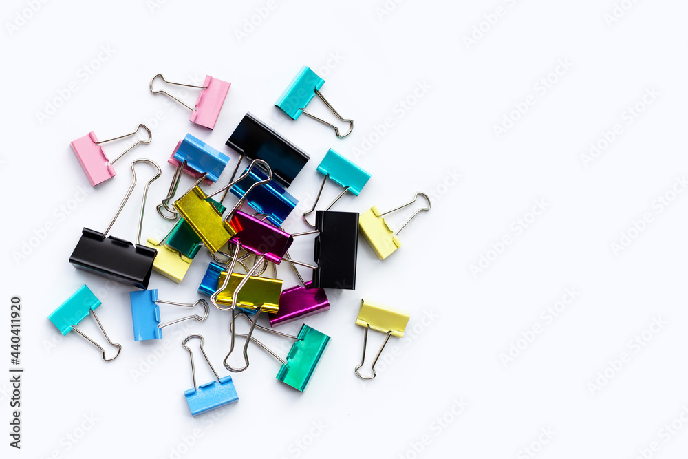 Colorful office paper clips on white background. Colorful office paper clips on white background.