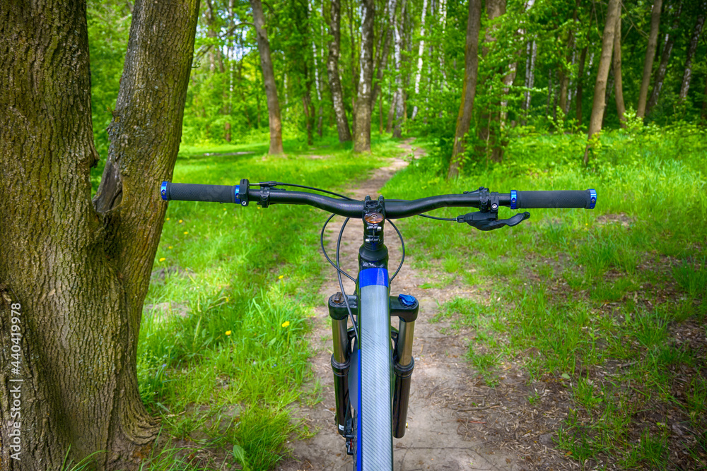 Enduro bicycle on the trail in the summer season Enduro bicycle on the trail in the summer season