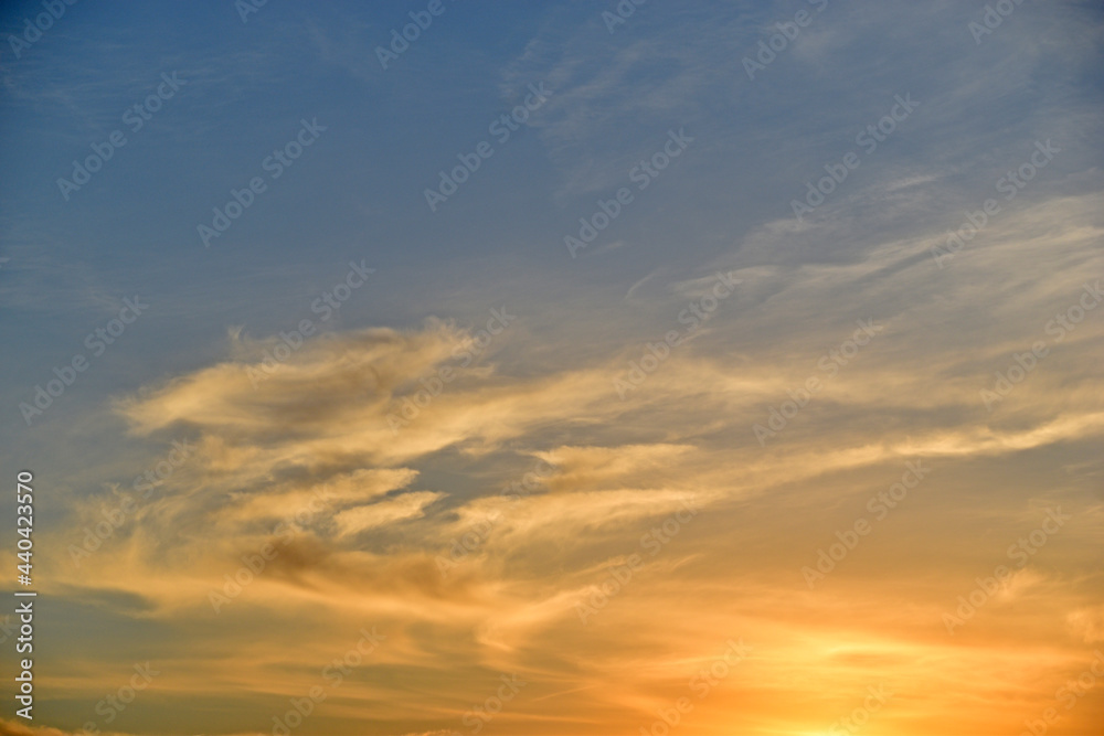 Sunset sky with clouds in the evening in summer