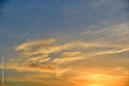 Sunset sky with clouds in the evening in summer